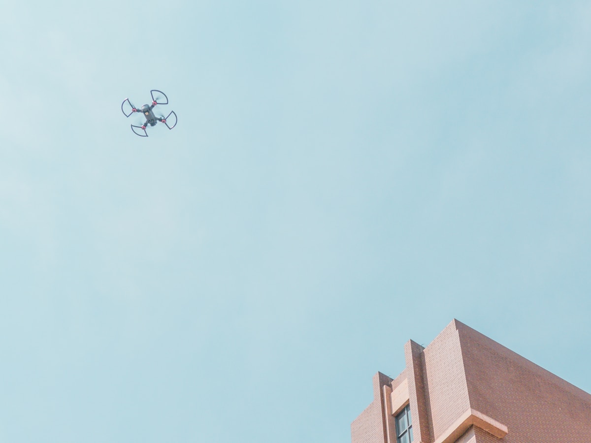 Drone inspecting a roof