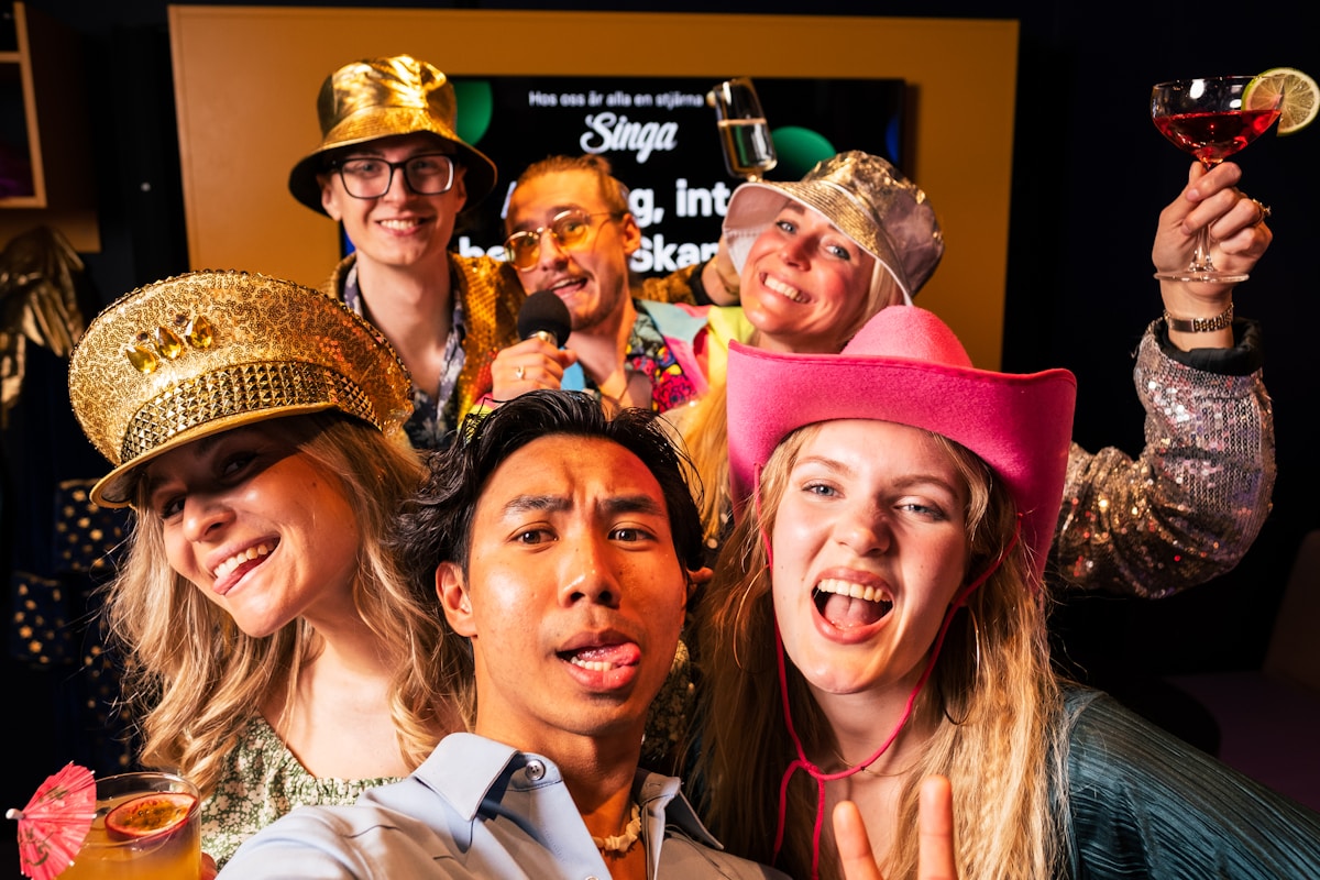 Guests posing at a magic mirror photo booth