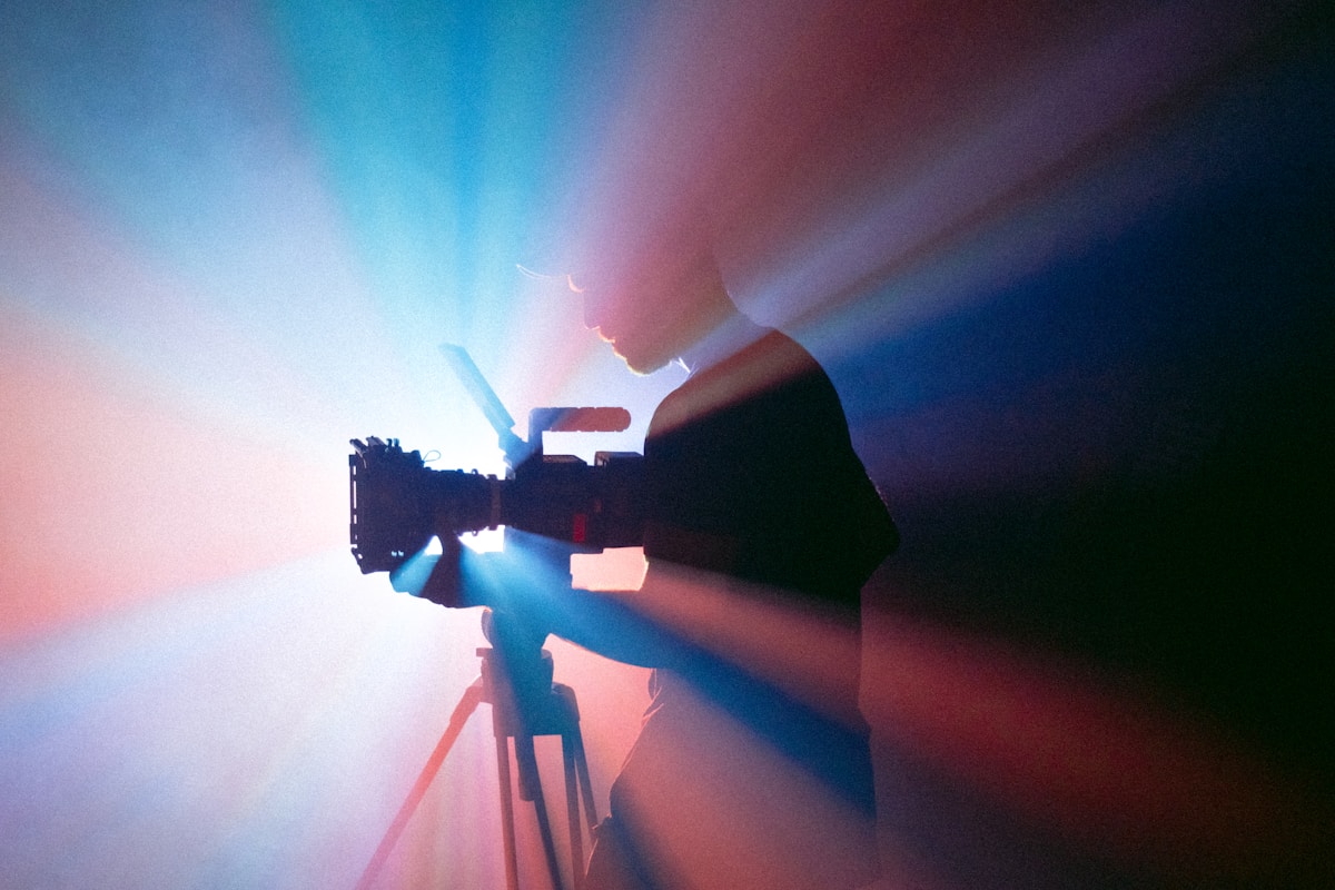 Wedding videographer filming with a cinema camera