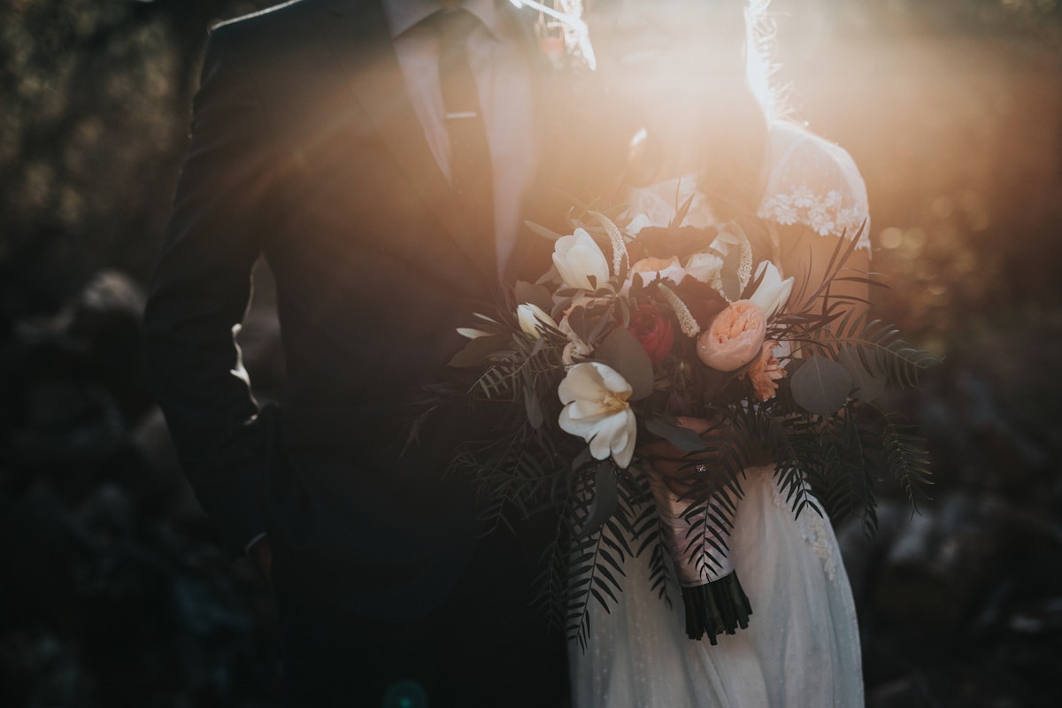Wedding couple with bouquet